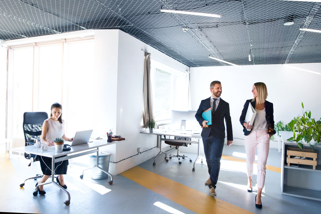 business-people-in-the-office-working-PBHS2SM.jpg